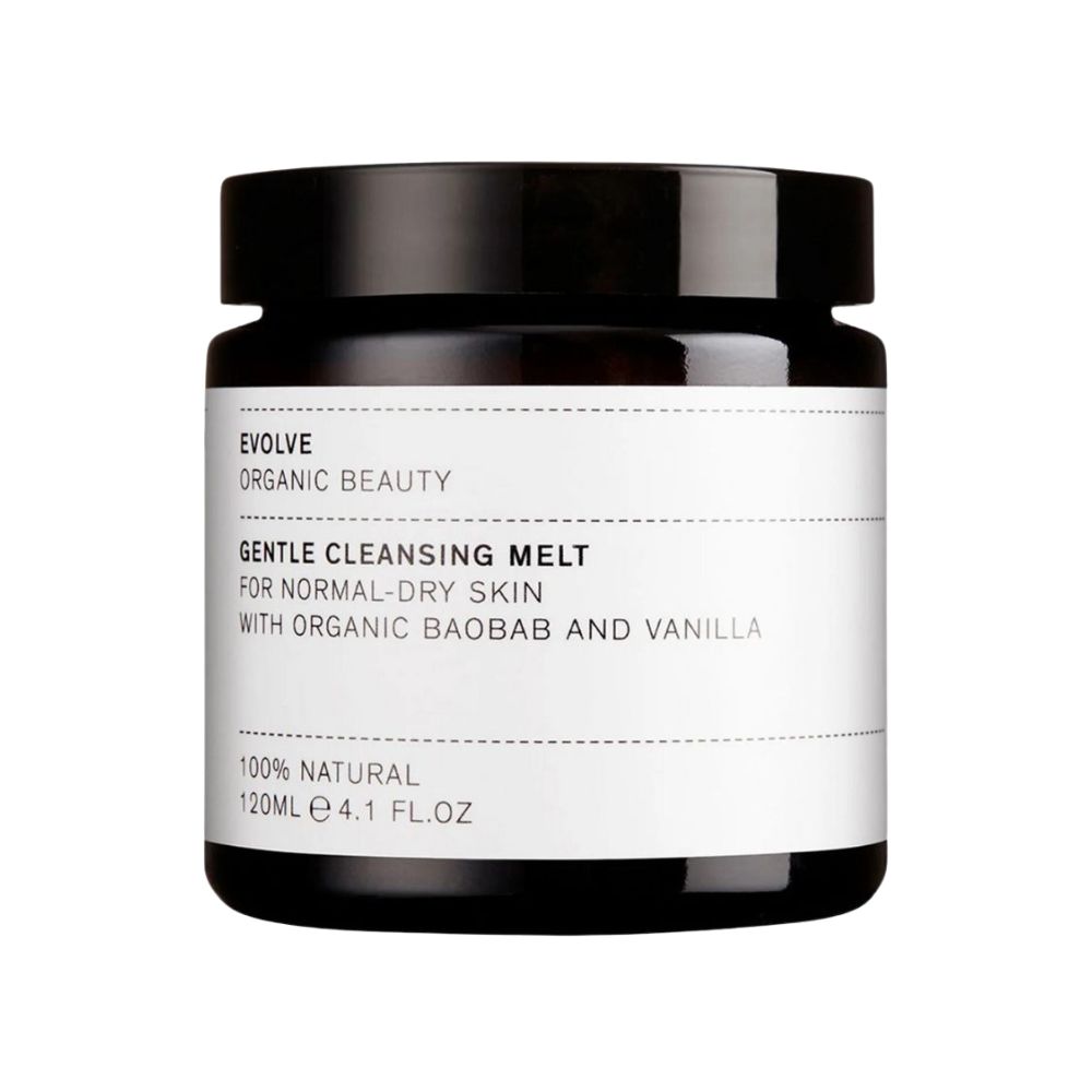 Pot en verre noir avec couvercle. Étiquette avec nom du produit et texte : Gentle Cleansing Melt, pour peaux normales à sèches. 120ml.