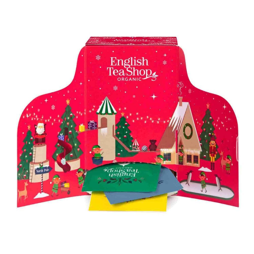 Adventskalender met geopende deuren. Merk: English Tea Shop. Theezakjes in verschillende kleuren zijn zichtbaar.