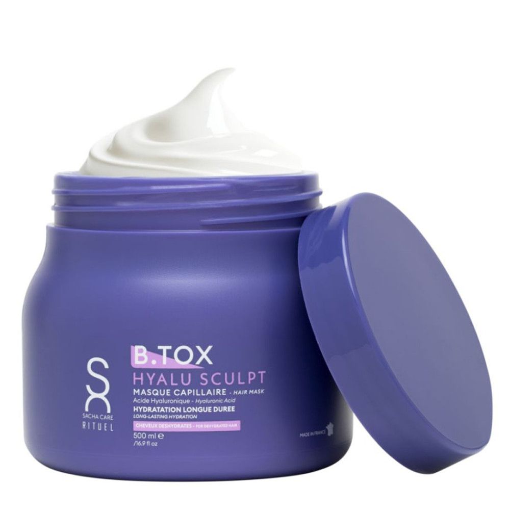 Paarse pot met witte crème. Open deksel ernaast. Tekst: B.TOX Hyalu Sculpt, Masque Capillaire, Hyaluronzuur, 500 ml.