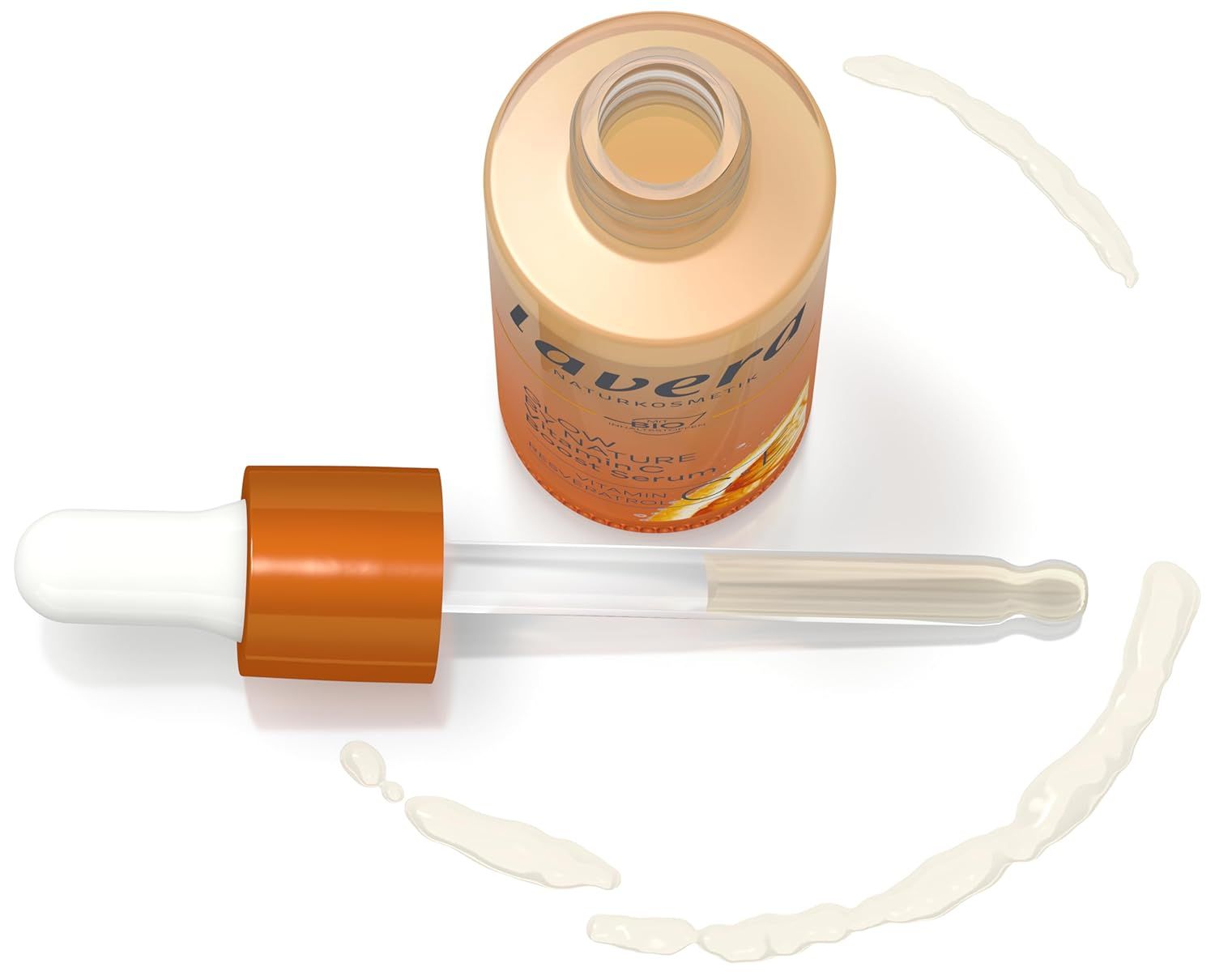 Flacon de sérum avec pipette et traces de produit. Flacon avec bouchon orange, pipette à embout blanc. Traces de produit autour.