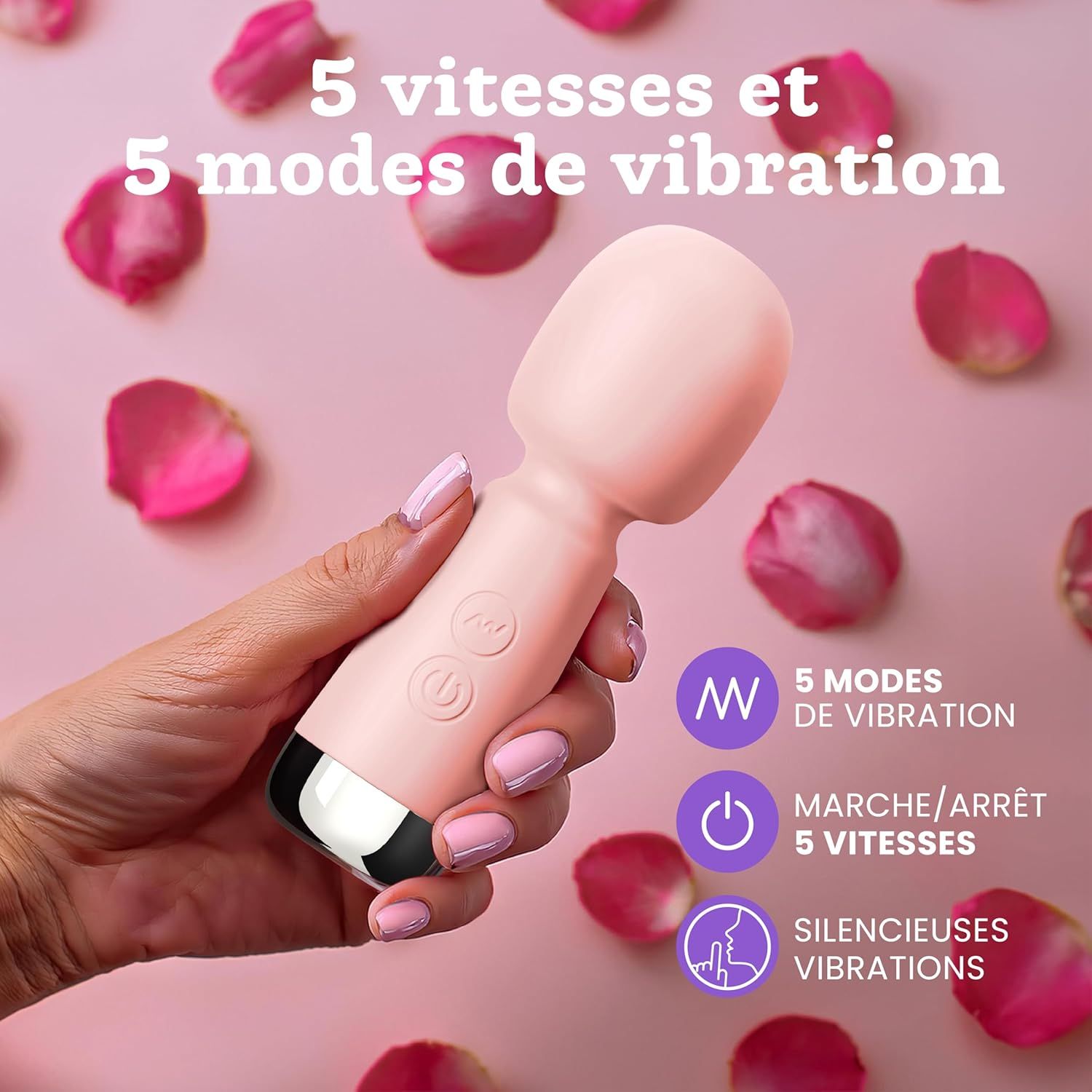 Un masseur baguette rose avec un accent argenté et des commandes.