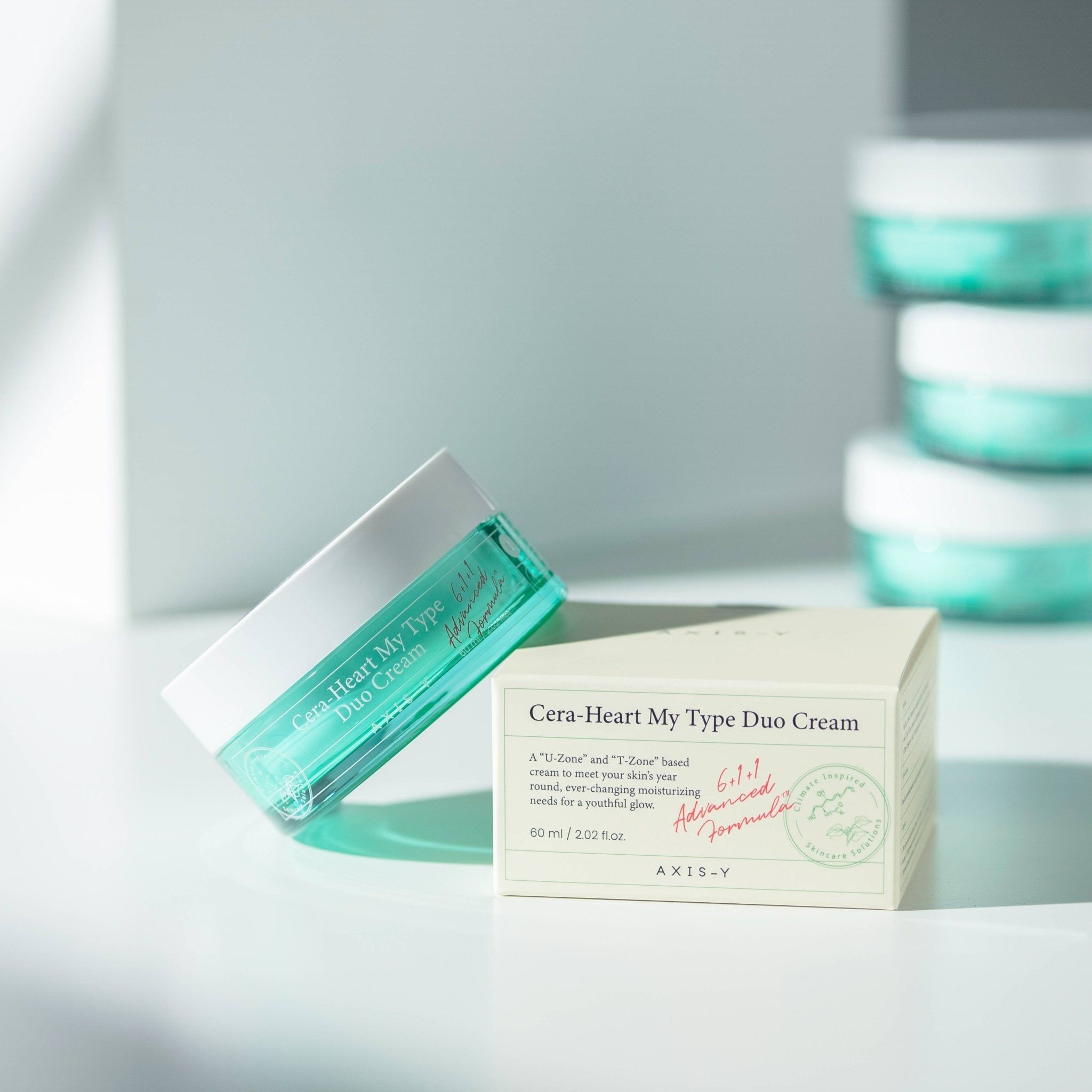 Crème pot en doos. Opschrift: Cera-Heart My Type Duo Cream. Merk: AXIS-Y. Doos met tekst.