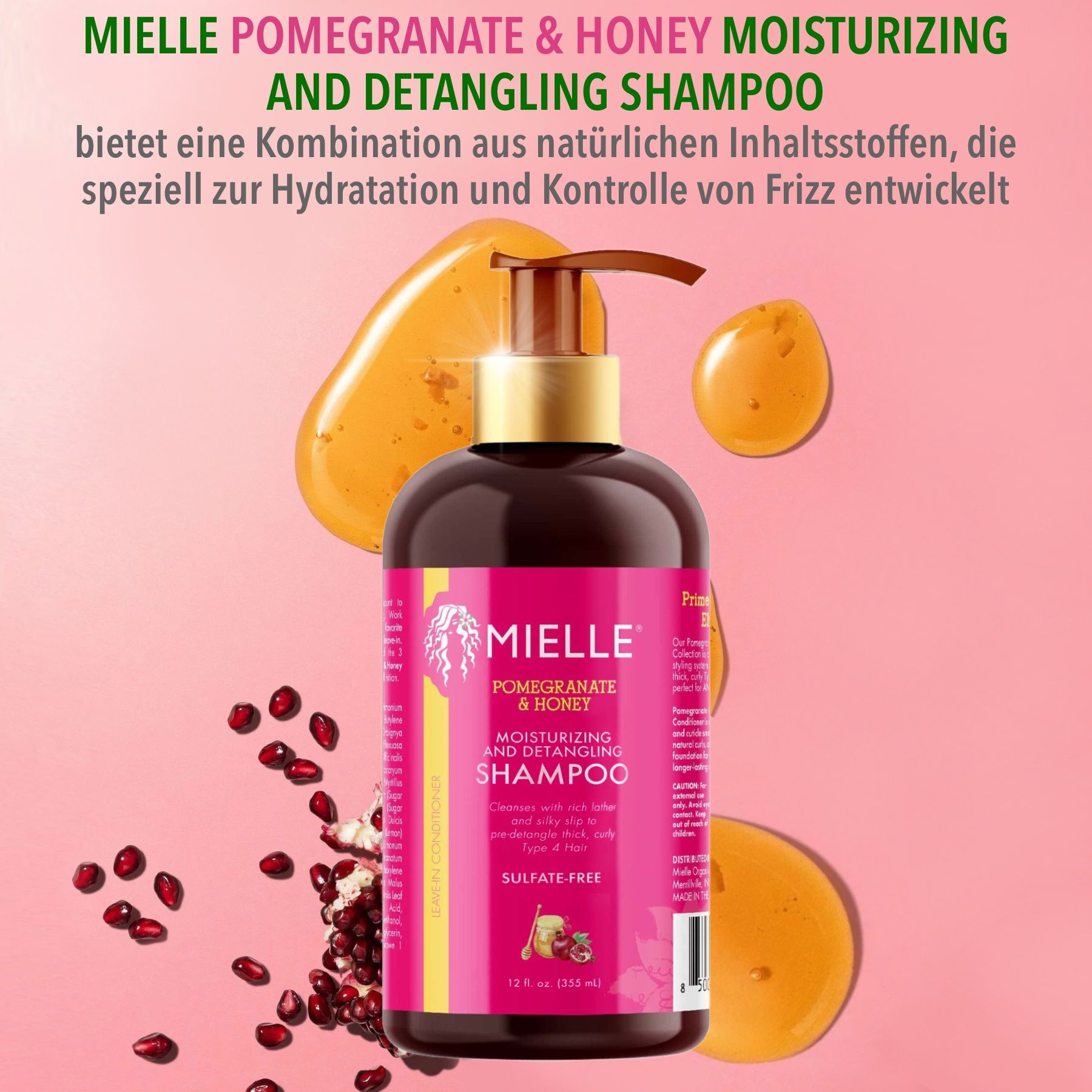 Une bouteille de shampooing Mielle Organics avec grenade et miel. Fond rose avec grenade et gouttes jaunes.