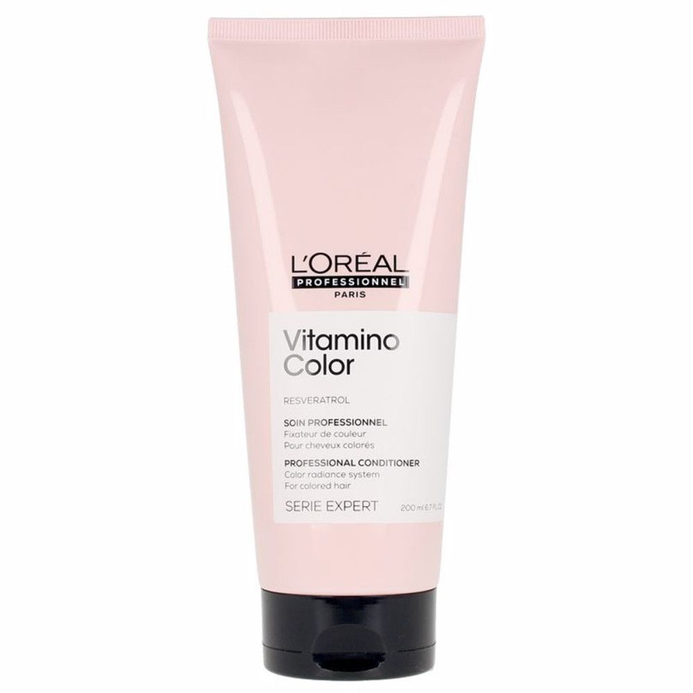 Tube rose avec bouchon noir. Inscriptions: L'Oréal Professionnel, Vitamino Color, Professional Conditioner. Pour cheveux colorés.