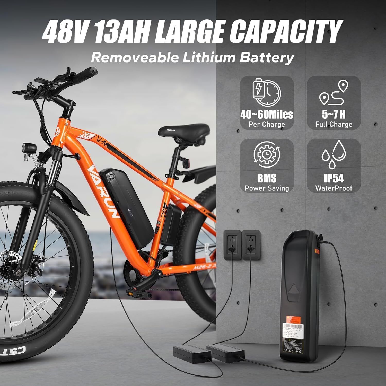 VTT électrique orange avec batterie amovible. Texte: 48V 13AH LARGE CAPACITY. Temps de charge et autonomie.