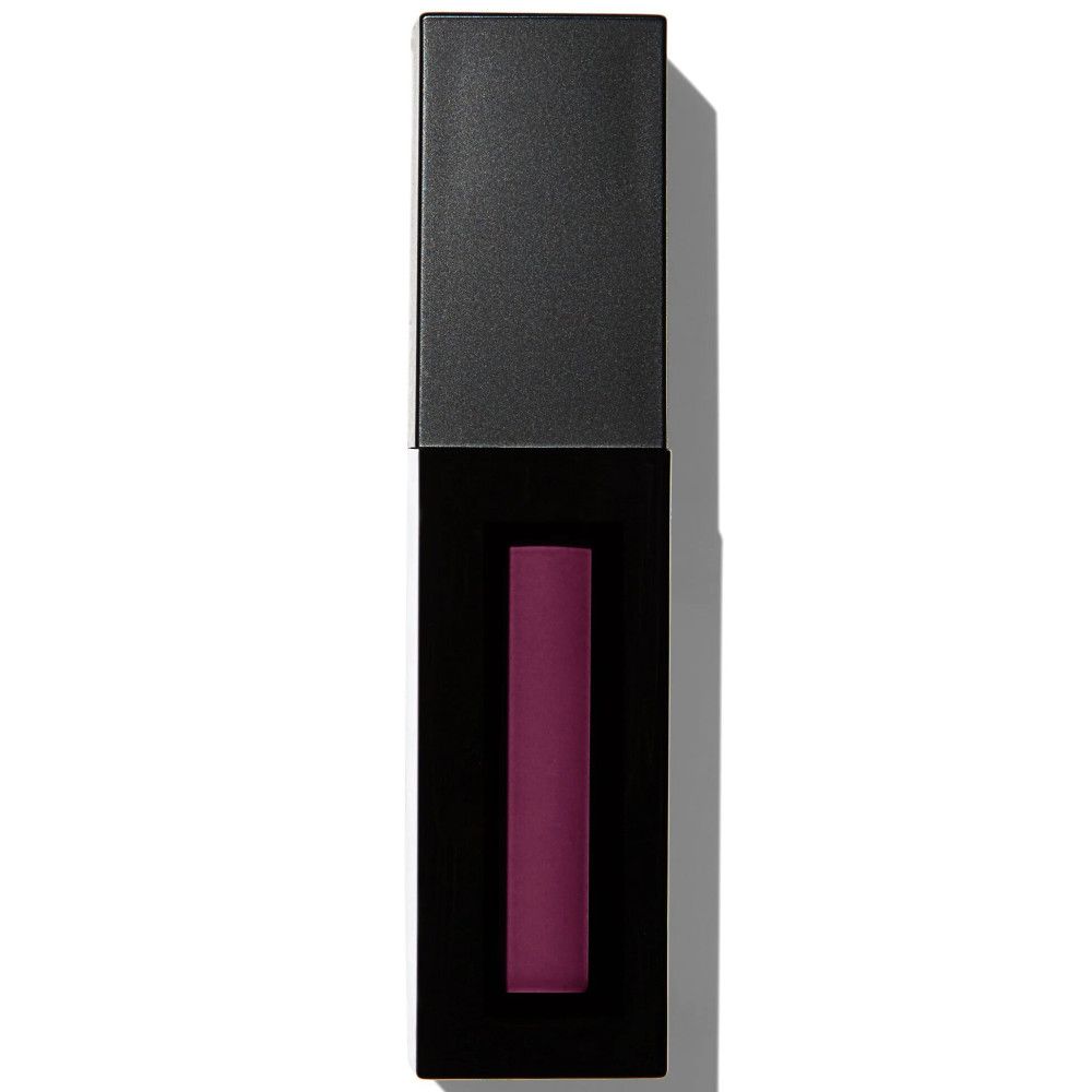 Tube de gloss noir de forme carrée. Le contenant révèle une teinte rose mat. Le bouchon est fermé.