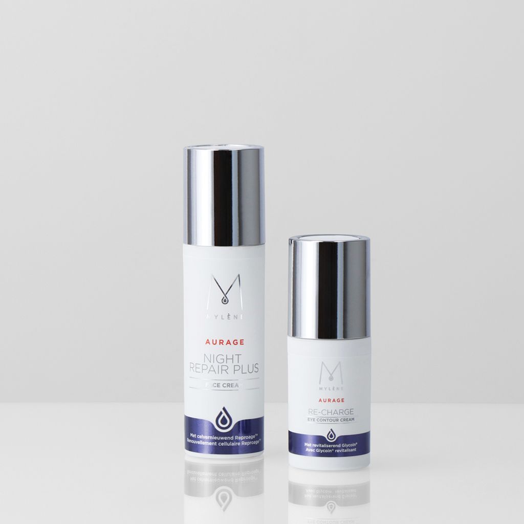 Deux produits de soin Mylène : crème de nuit réparatrice et crème contour des yeux dans des flacons blancs avec capuchons argentés.