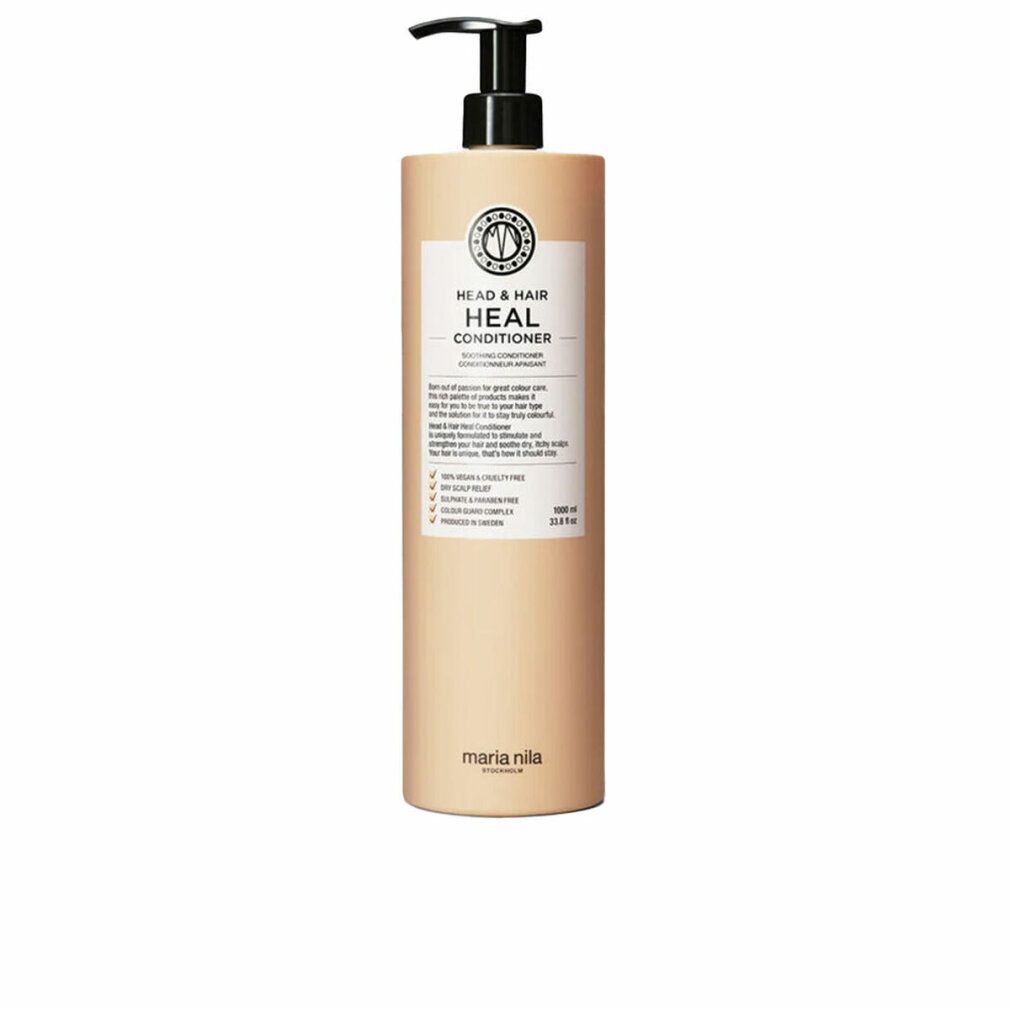 Hoge, beige fles met zwarte pomp. Etiket met tekst: HEAD & HAIR HEAL CONDITIONER. Merk: Maria Nila.