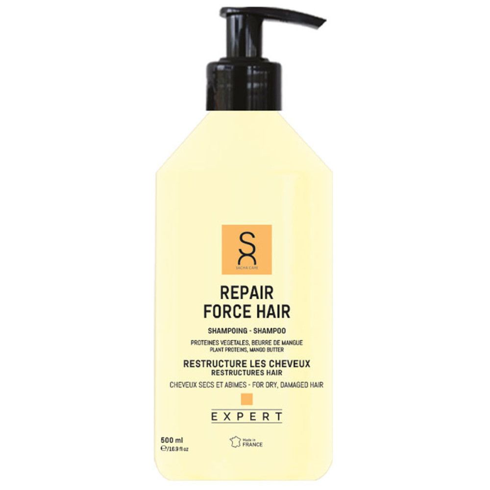 Geelachtige shampoo fles met zwarte pomp. Opschrift: Repair Force Hair, Expert. Voor droog, beschadigd haar.