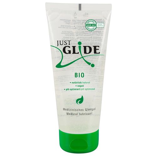 Tube transparente avec bouchon vert. Inscription: JUST GLIDE BIO. Contient un lubrifiant végétalien et pH optimisé. Label: Très bon.