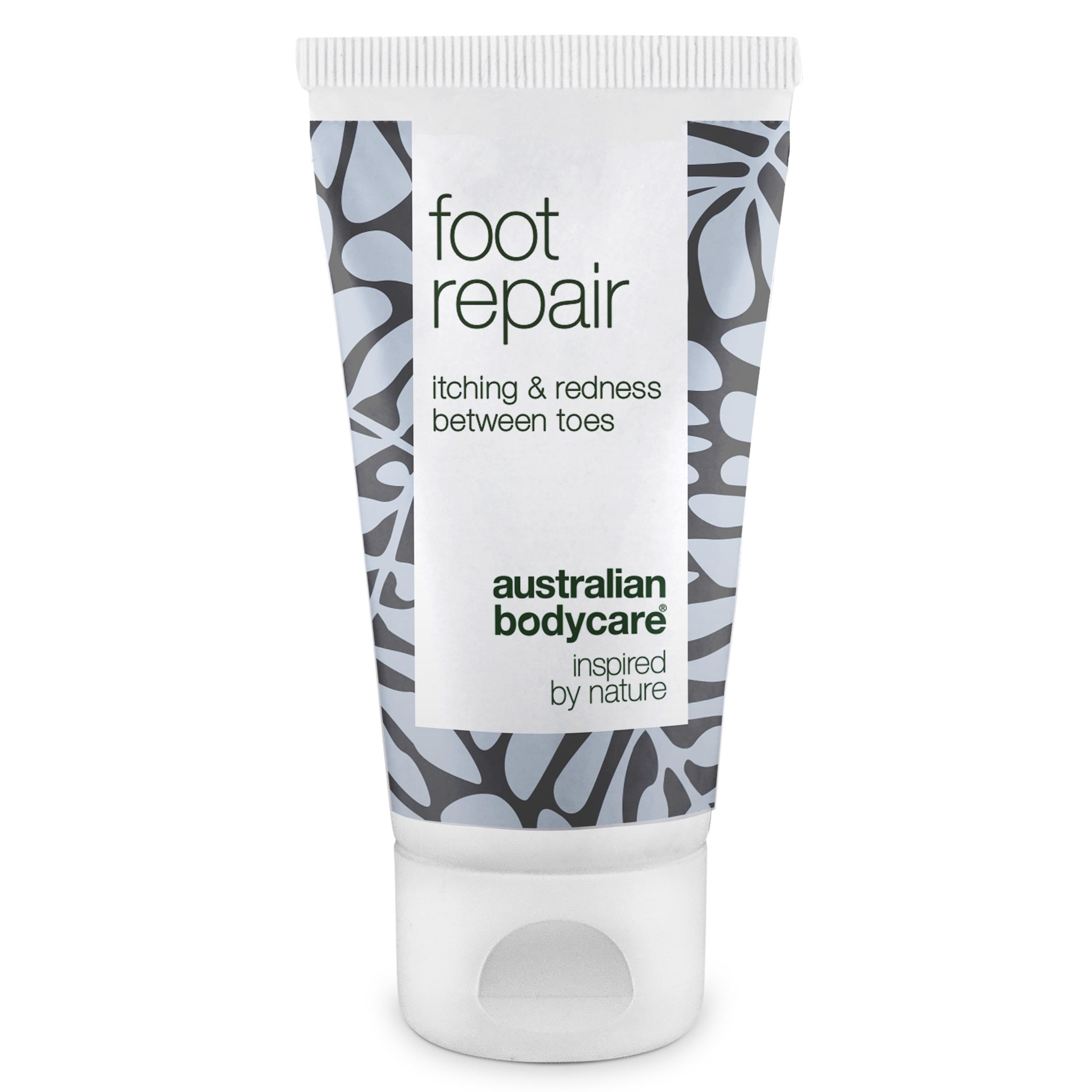 Voetverzorging tube. Wit, bloemenpatroon en tekst: foot repair, itching & redness between toes, Australian Bodycare.