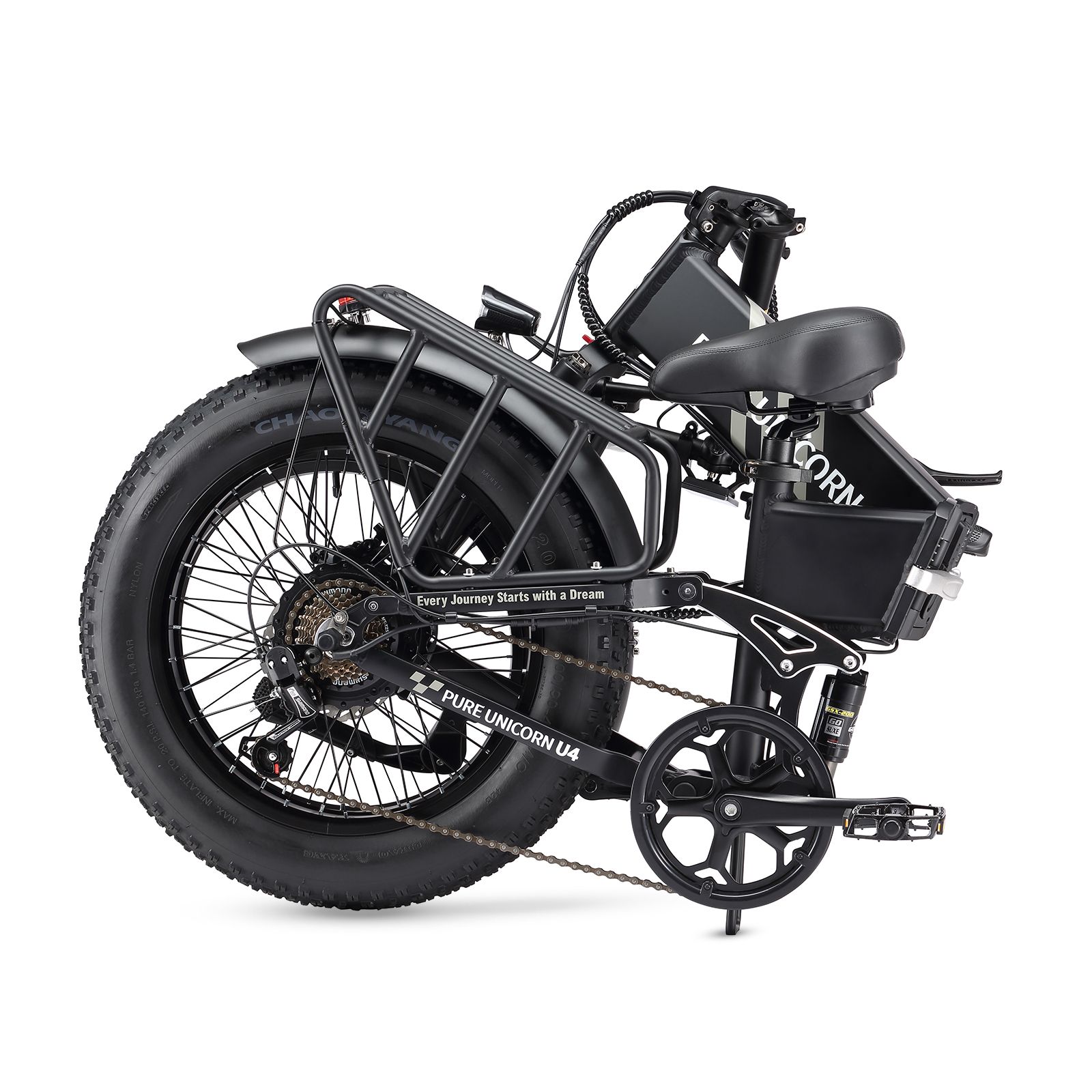 Vélo électrique noir plié, pneus larges. Marque PURE UNICORN. Porte-bagages et selle.