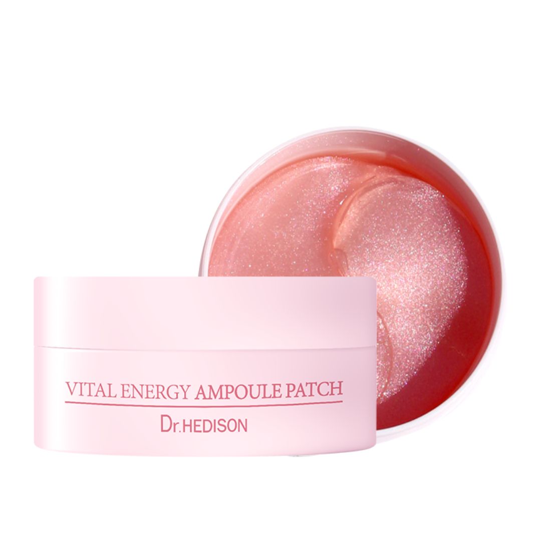 Boîte rose avec patchs pour les yeux. Inscription : Vital Energy Ampoule Patch, Dr. HEDISON. Boîte ouverte avec gel rose.