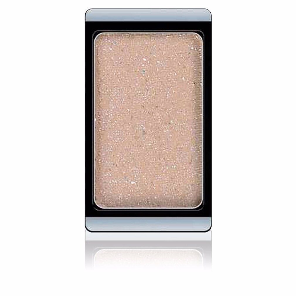 Oogschaduw in rechthoekige vorm. Beige-roze tint met glitter. Zwart kader, zilverkleurige rand.