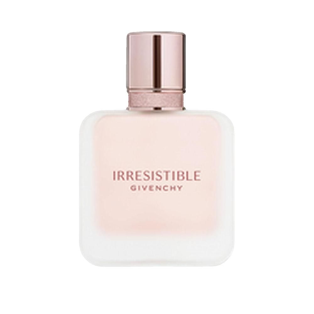 Flacon de parfum rose. Forme carrée aux coins arrondis. Bouchon or rose. Inscription "IRRESISTIBLE GIVENCHY".