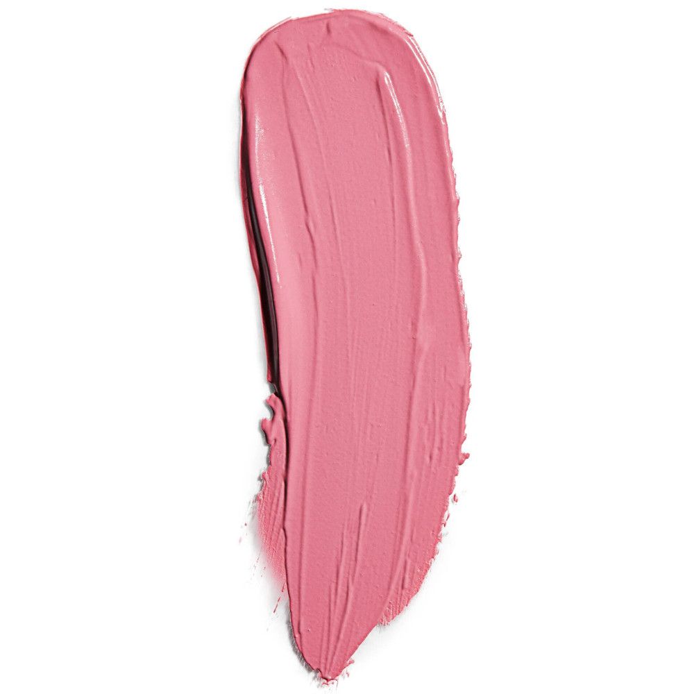 Échantillon de rouge à lèvres rose sur fond blanc. La texture est mate et couvrante.