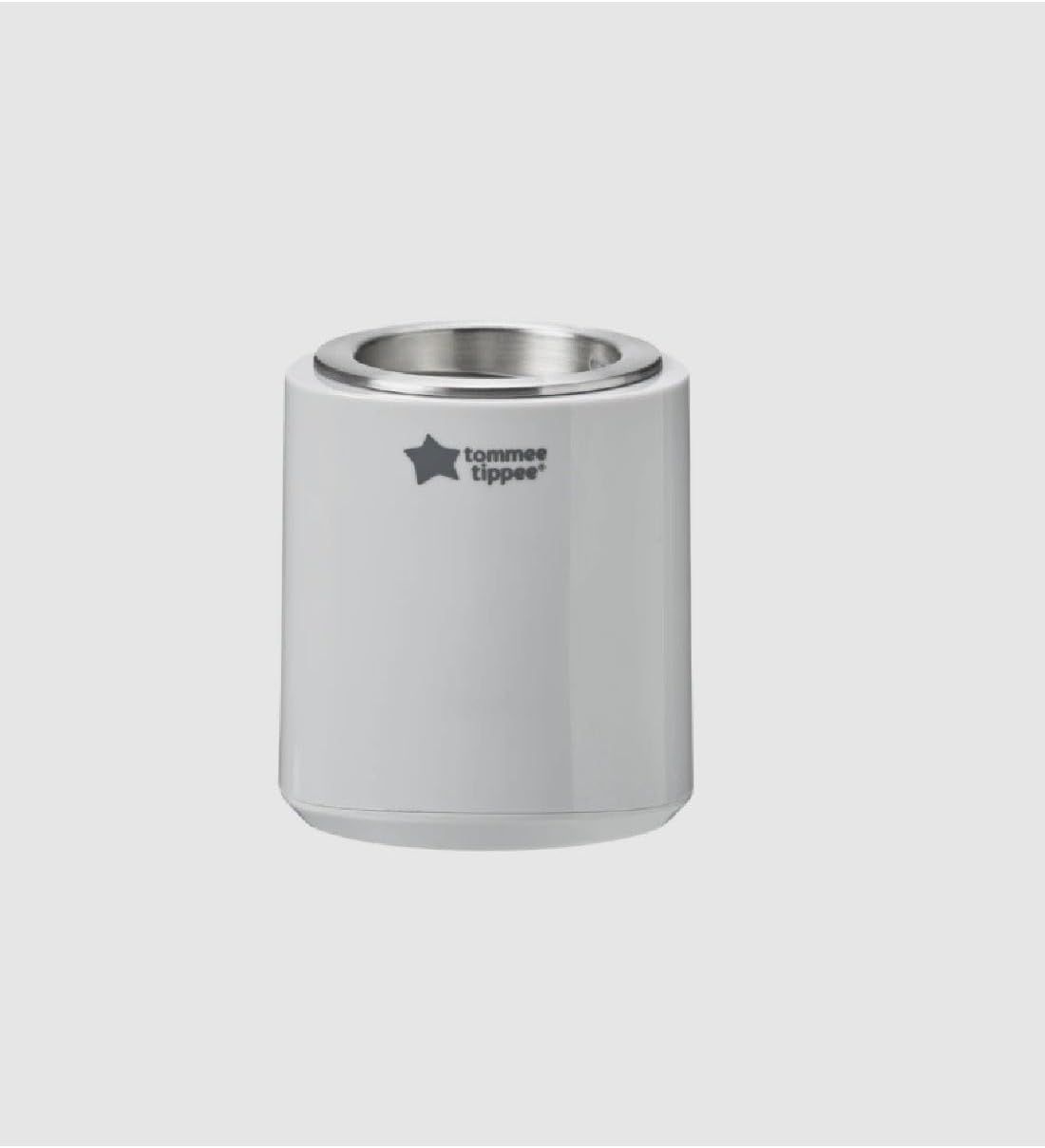 Witte flessenwarmer met zilveren rand en Tommee Tippee logo.