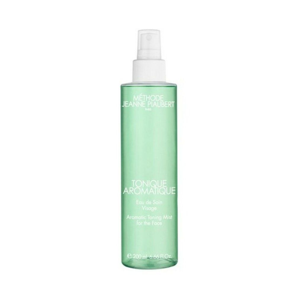 Groene sprayfles met witte sproeikop. Tekst: Tonique Aromatique, Eau de Soin Visage, Aromatic Toning Mist for the Face.
