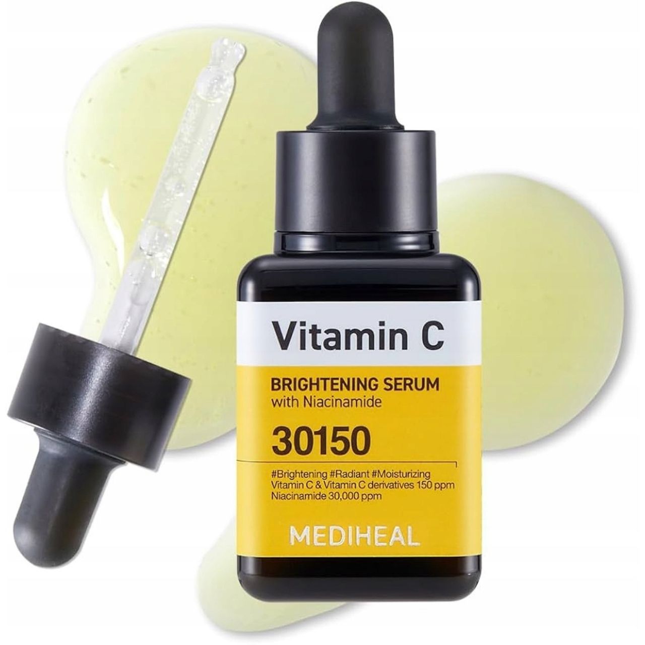Flacon de sérum Mediheal Vitamine C avec pipette, entouré de gouttes de sérum. Étiquette jaune avec informations produit.