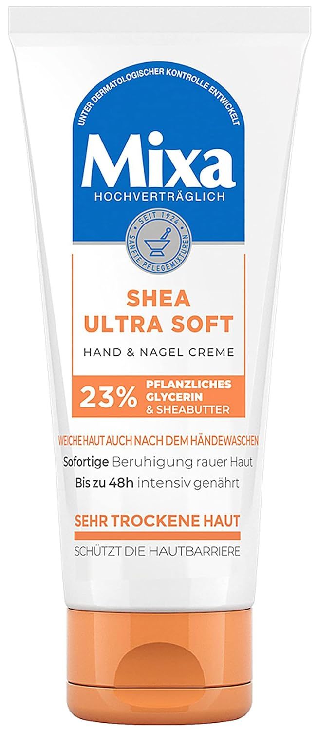Tube blanche Mixa Shea Ultra Soft Hand & Nagelcreme. Contient 23% de glycérine et beurre de karité.