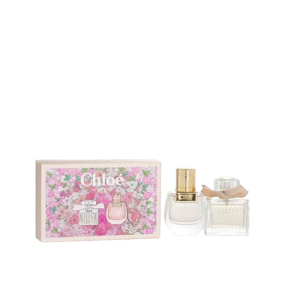Geschenkset met twee parfumflesjes en een doos met bloemenpatroon. Op de doos staat "Chloé".