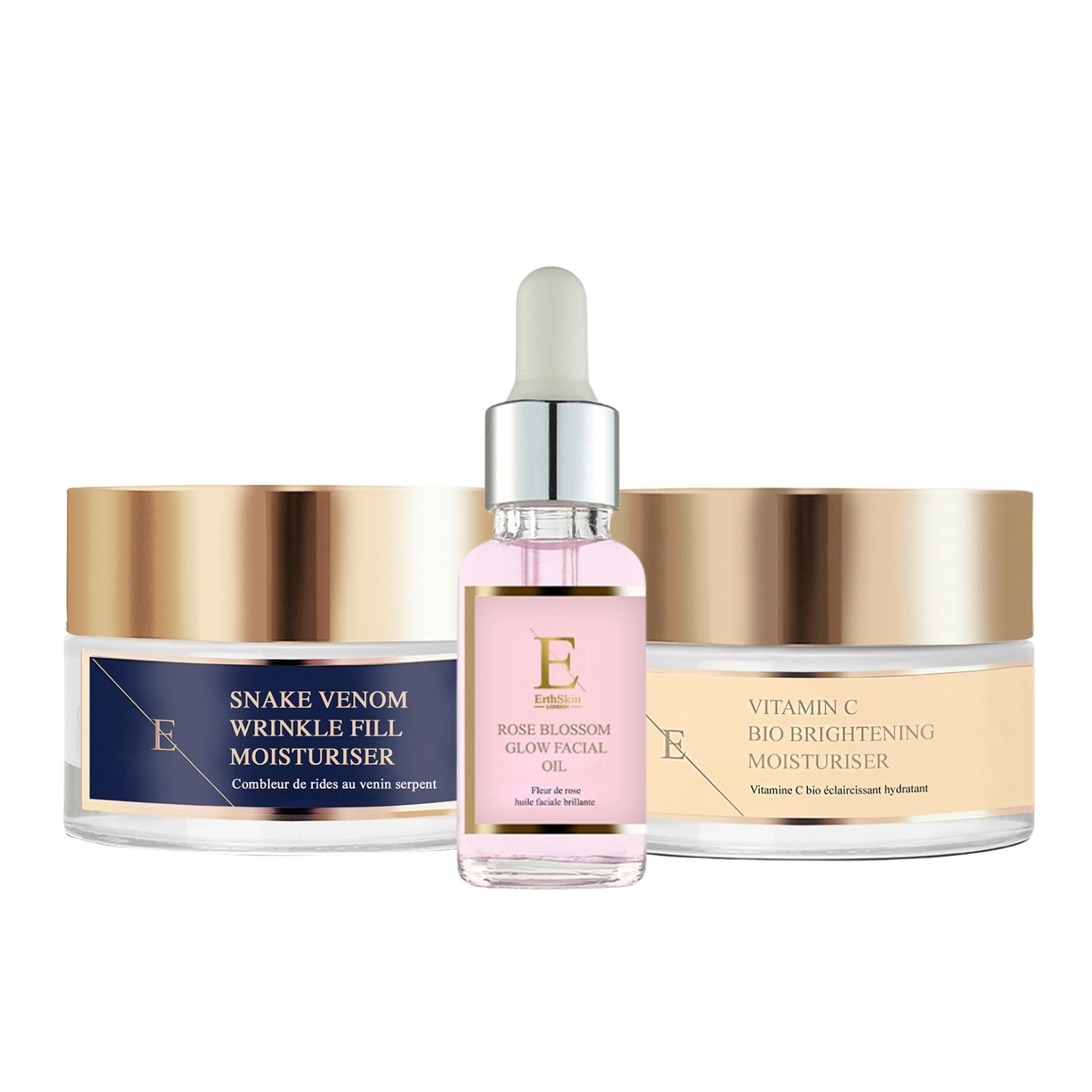 Ensemble de soins pour la peau. Pots et flacon en verre. Couvercles dorés, étiquettes bleues et beiges. Marque visible.