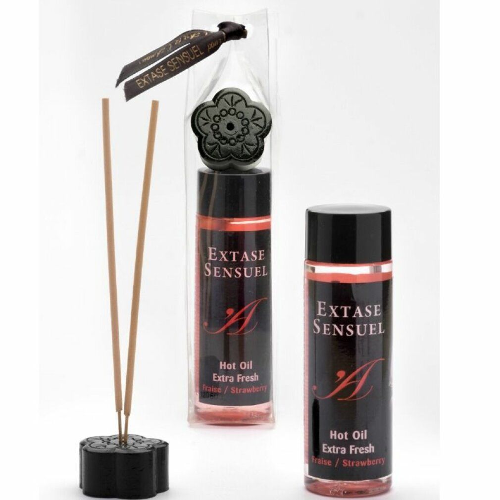 Deux bouteilles d'Extase Sensuel Huile Chaude Extra Fraîche Fraise et un support avec des bâtons d'encens.