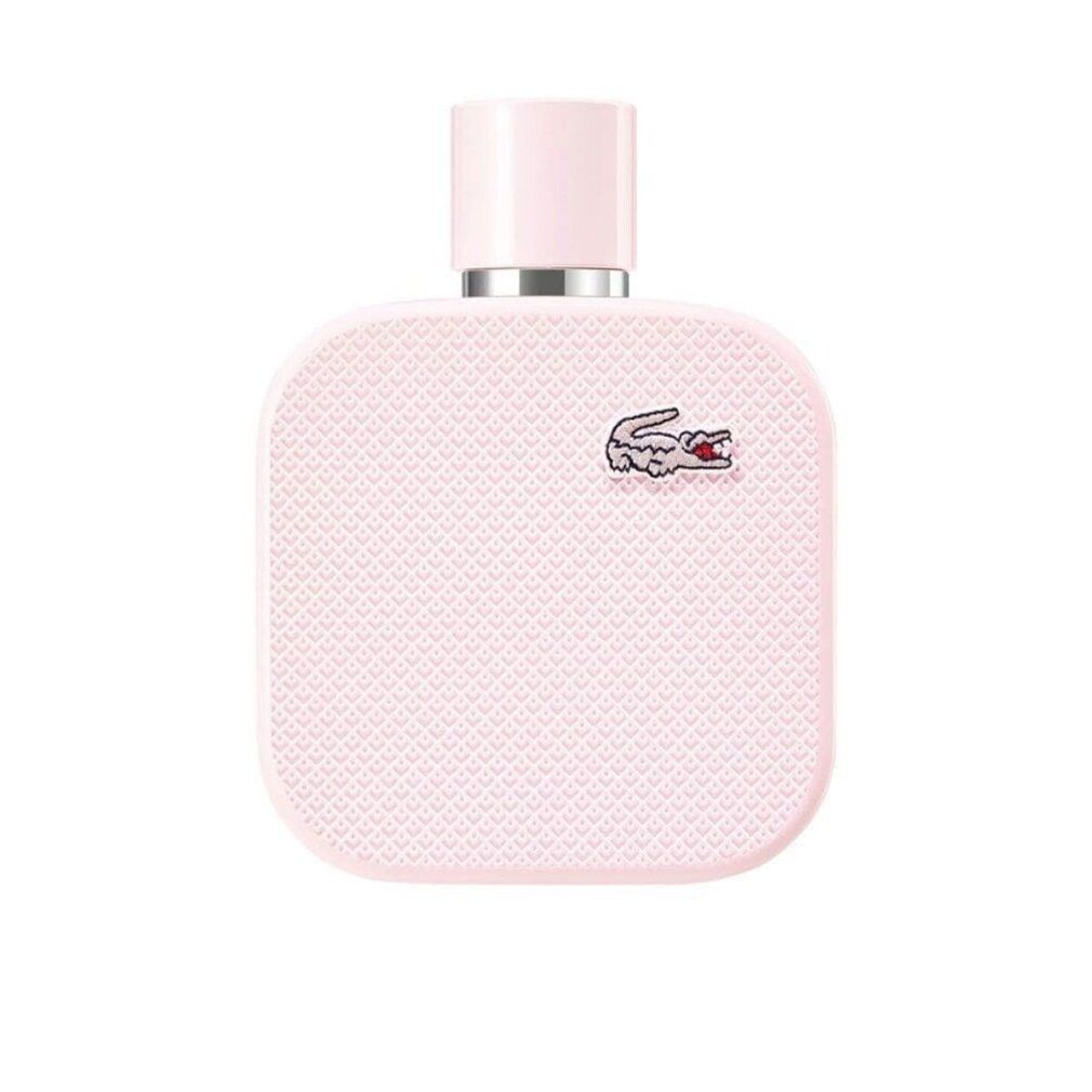 Flacon rose, col argenté, bouchon rose. Logo crocodile. Forme carrée, surface gaufrée.