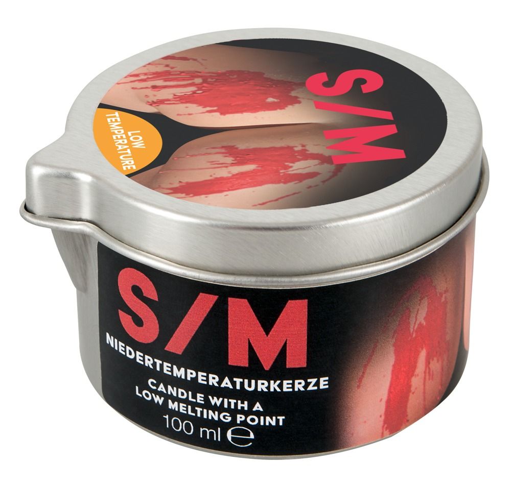 Boîte cylindrique avec couvercle. Inscription S/M et Niedertemperaturkerze. Fond noir avec texte rouge. 100 ml.