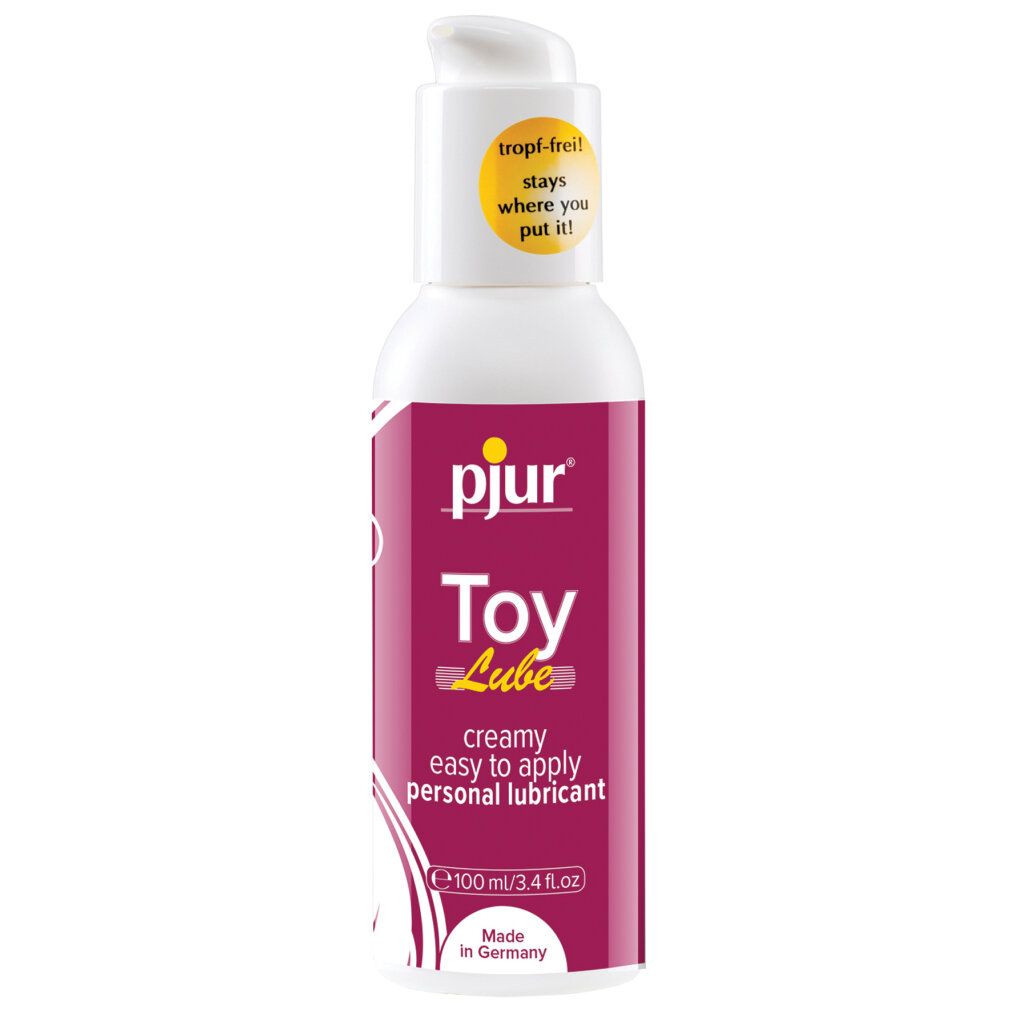 Witte fles met pomp. Opschrift: pjur, Toy Lube. Rode achtergrond. Sticker: druppelvrij. Made in Germany.