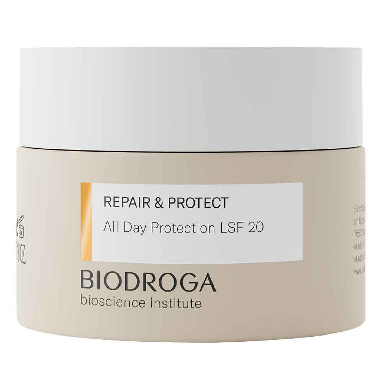 Crèmepot met witte deksel. Opschrift: REPAIR & PROTECT, All Day Protection LSF 20. Merk: BIODROGA.
