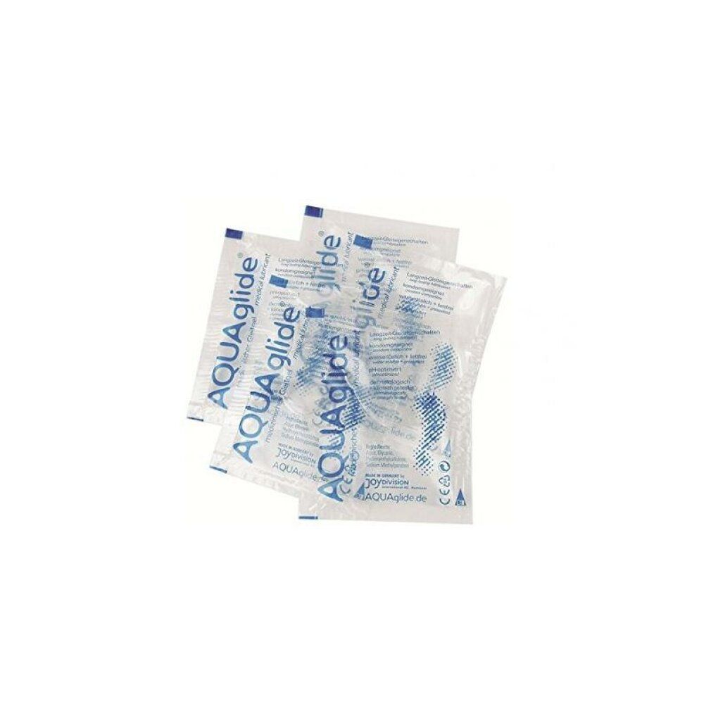 Trois sachets individuels transparents avec texte "AQUAglide". Texte : "lubrifiant médical". Emballage individuel avec texte bleu.