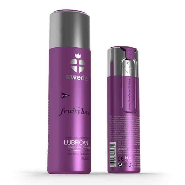 Deux flacons de lubrifiant Fruity Love. Flacons violets avec bouchons argentés. Inscription : swede, Fruity Love, Lubricant.