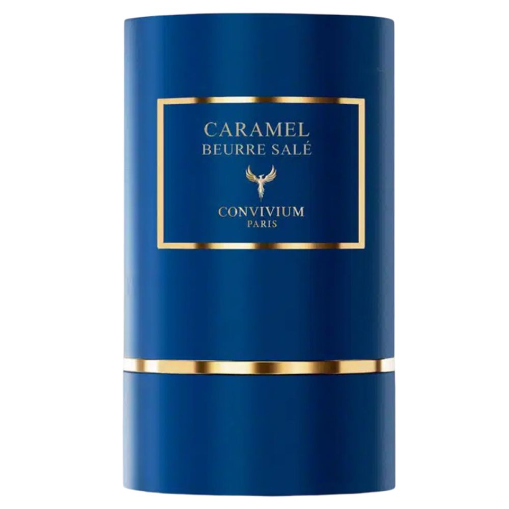 Cilindrische blauwe verpakking met gouden accenten. Opschrift "CARAMEL BEURRE SALÉ" en "CONVIVIUM PARIS".