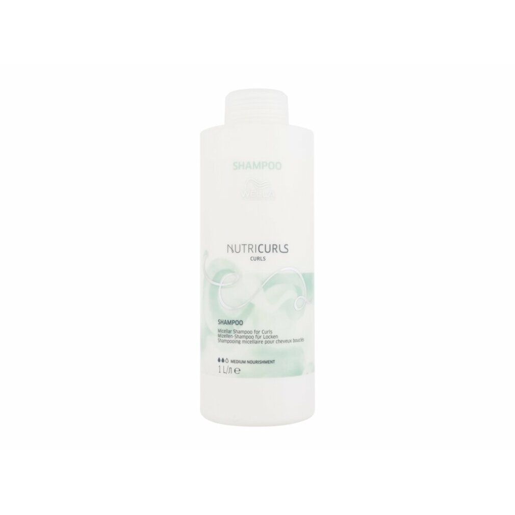 Witte shampoo fles. Opschrift: SHAMPOO, NUTRICURLS. Voor krullen. 1 liter. 8-in-1 medium ingrediënt.