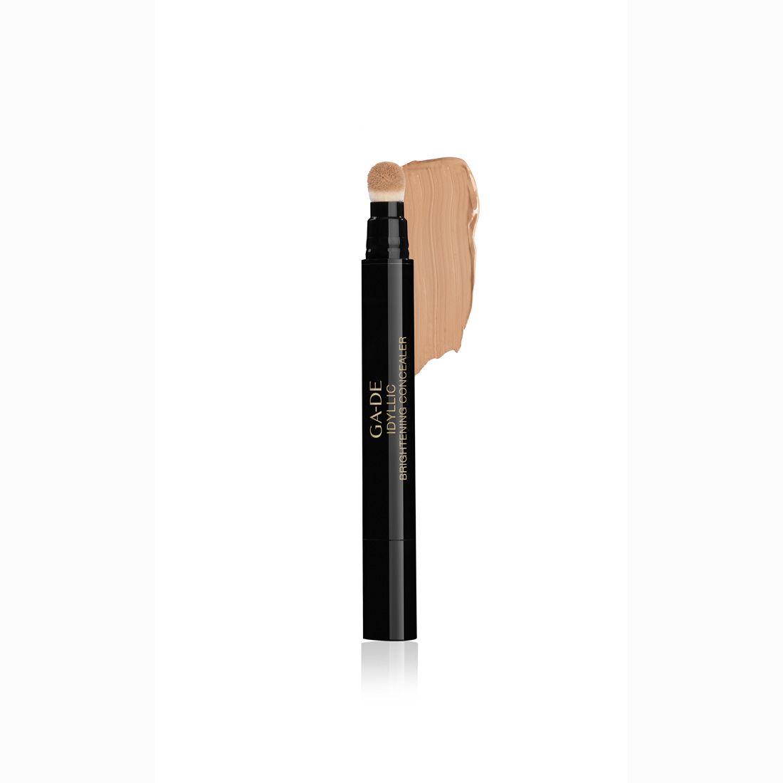 Stylo correcteur noir avec applicateur éponge et échantillon de couleur. Inscription: Ga-De Idyllic Brightening Concealer.