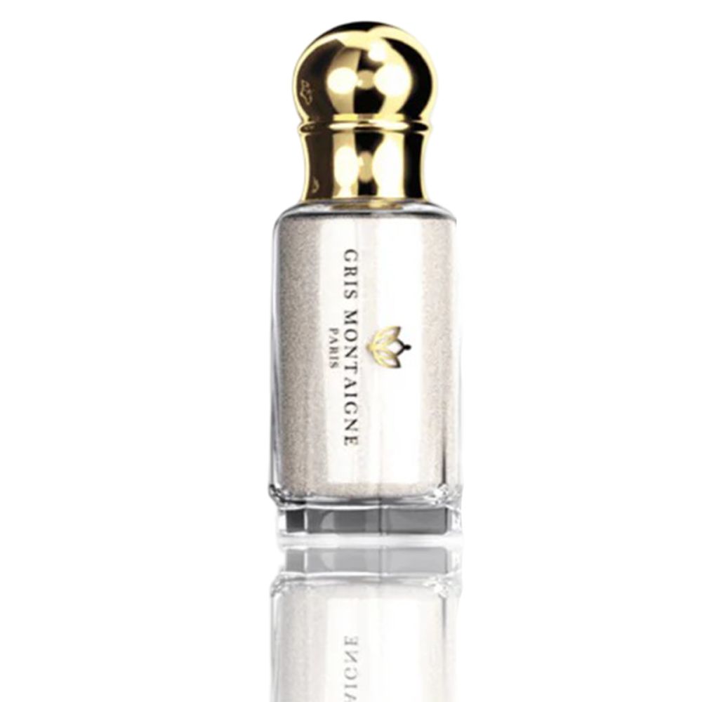 Flacon transparent avec bouchon doré. Inscription: Gris Montaigne Paris. Petit logo.