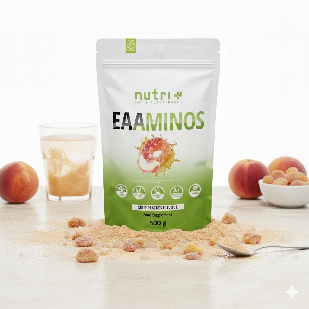 Witte stand-up pouch verpakking "EAAMINOS" met perzik-design, omringd door perziken en poeder.