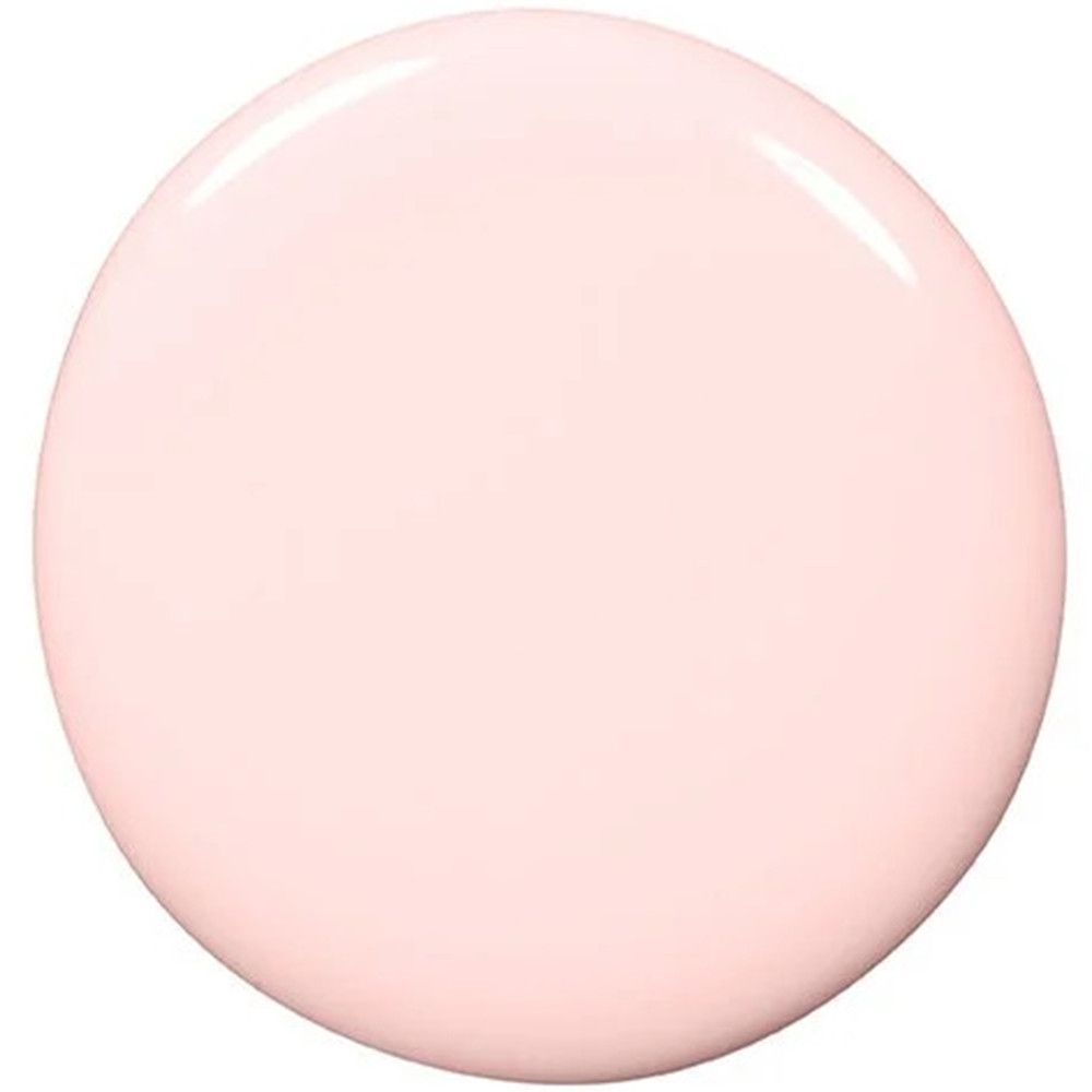 Goutte de vernis à ongles rose pâle.