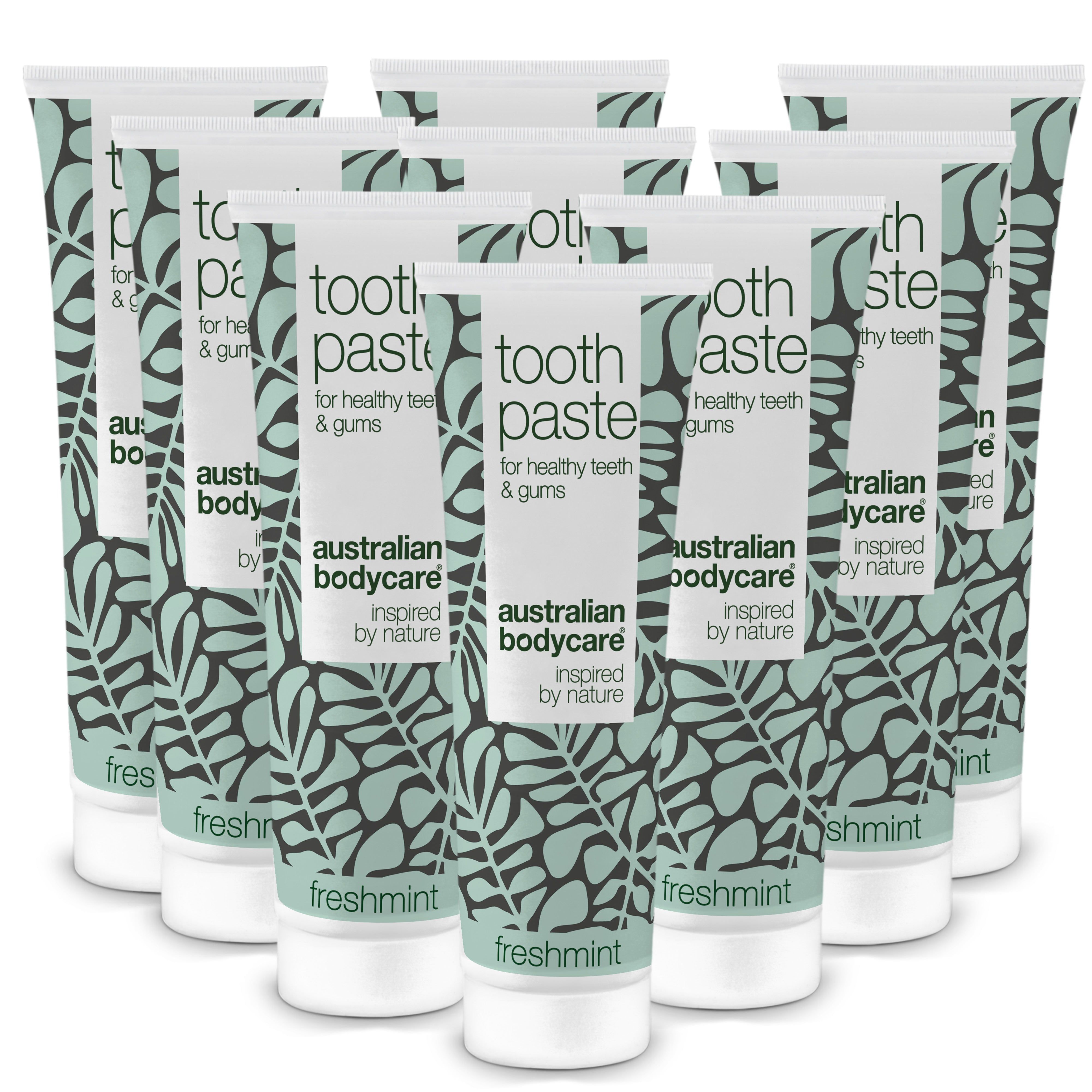 Witte tandpastatubes met groen patroon. Opschrift: Australian Bodycare, freshmint. Meerdere tubes.
