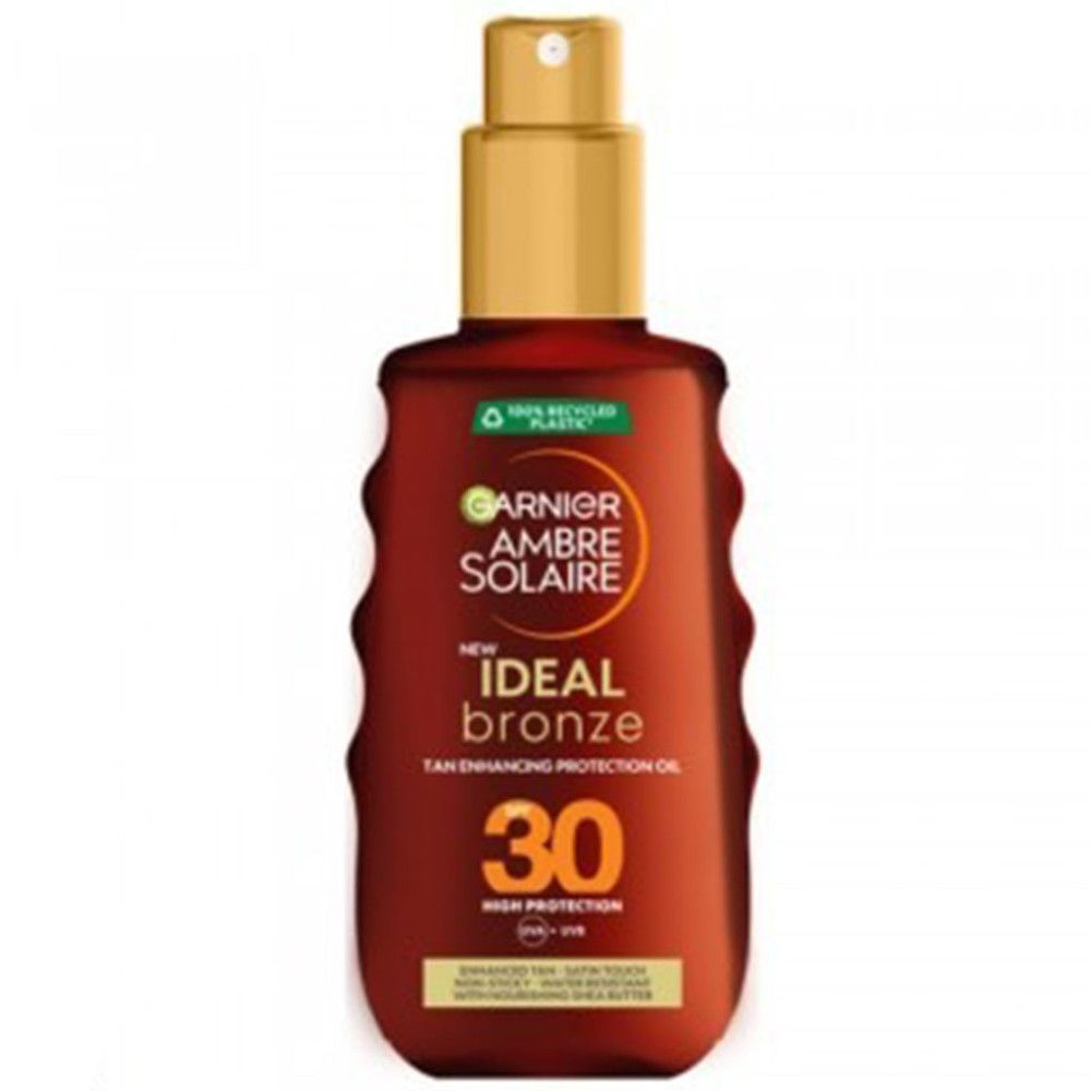Bruine fles met gouden spraykop. Opschrift: Garnier Ambre Solaire Ideal Bronze SPF 30. 100% gerecycled plastic.
