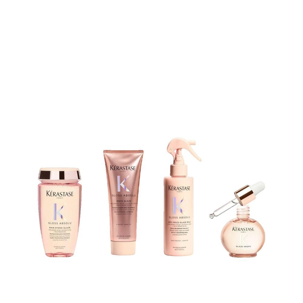 Vier producten: shampoo, conditioner, spray en olie. Roze verpakking. Kérastase-logo. Gloss Absolu-productlijn.