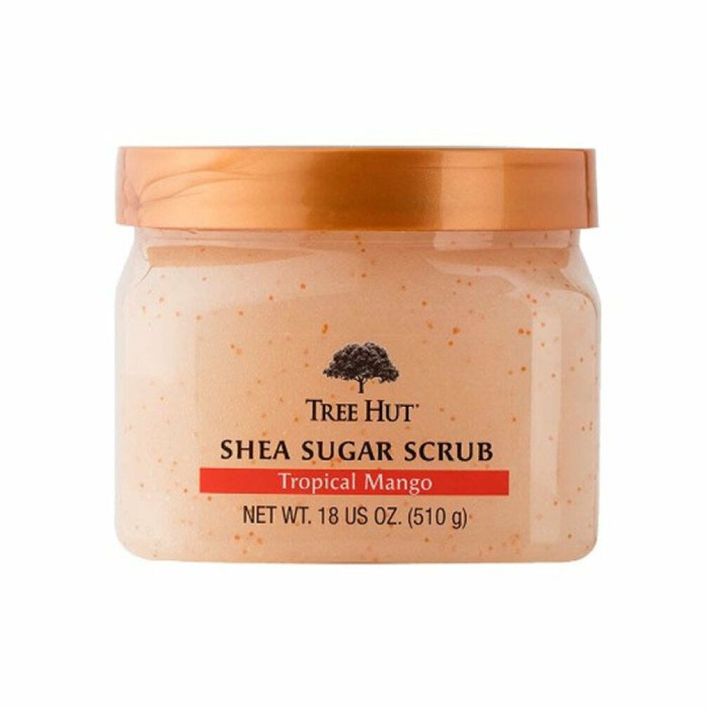 Gommage au sucre Tree Hut Shea Tropical Mango dans un pot transparent avec un couvercle orange.
