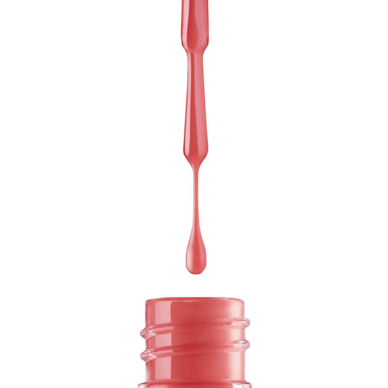 Druppel roze nagellak, druppelend uit een flesje. Kwast zichtbaar.