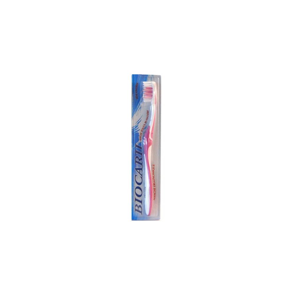 Brosse à dents Biocaril emballée. Soies roses, manche blanc, emballage bleu avec logo.