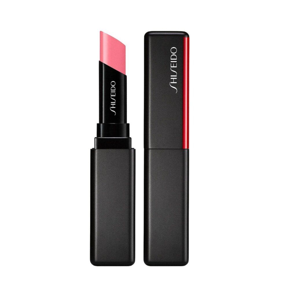 Rouge à lèvres Shiseido ouvert, rose. Boîtier noir avec accent rouge. Boîtier fermé à côté. Logo Shiseido visible.