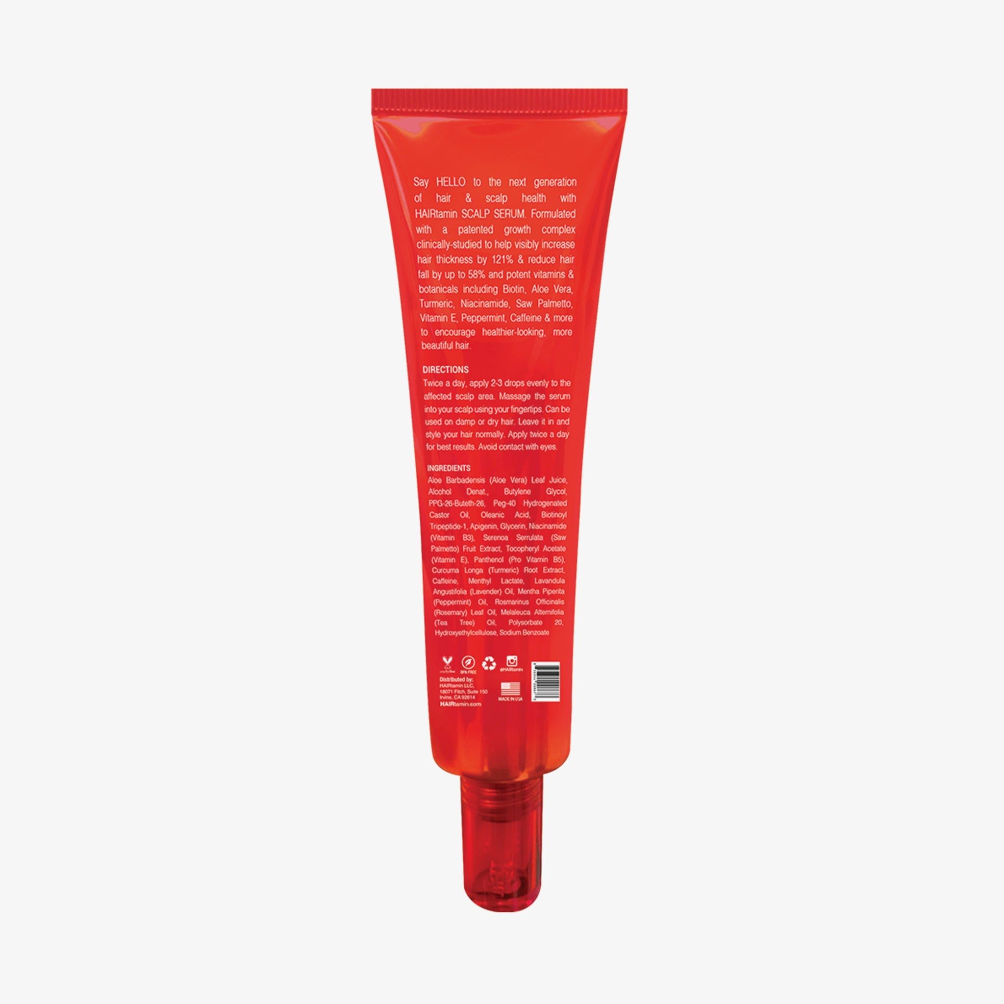 Dos d'un tube rouge avec texte. Contient ingrédients et instructions. Marque : HAIRTAMIN.