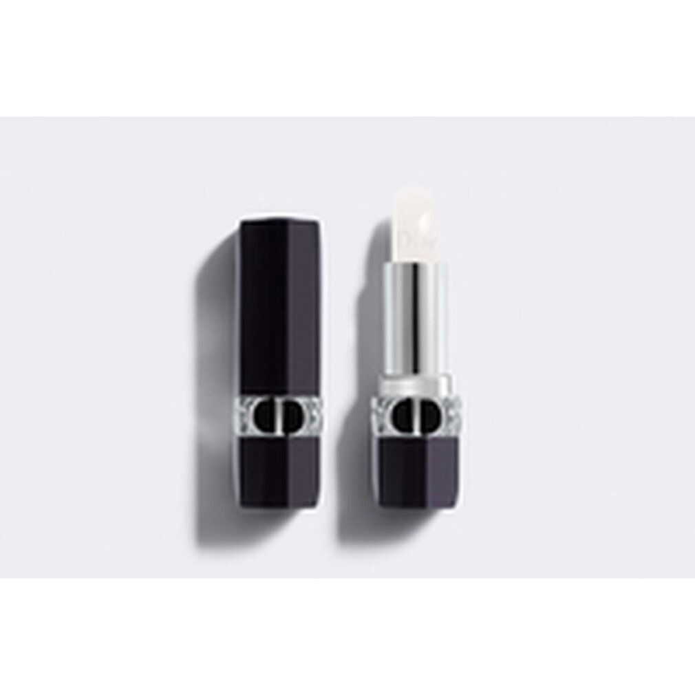 Baume à lèvres noir ouvert. Tube argenté avec baume blanc. Logo Dior sur le baume. Capuchon noir à côté.