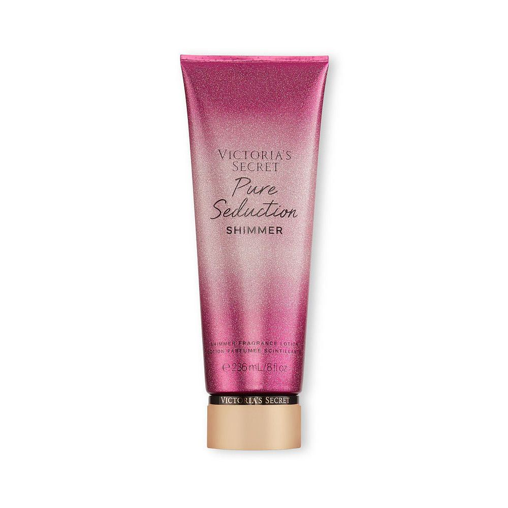 Lotion pour le corps Victoria's Secret Pure Seduction Shimmer dans un emballage rose scintillant. 250ml / 8.4 fl oz.