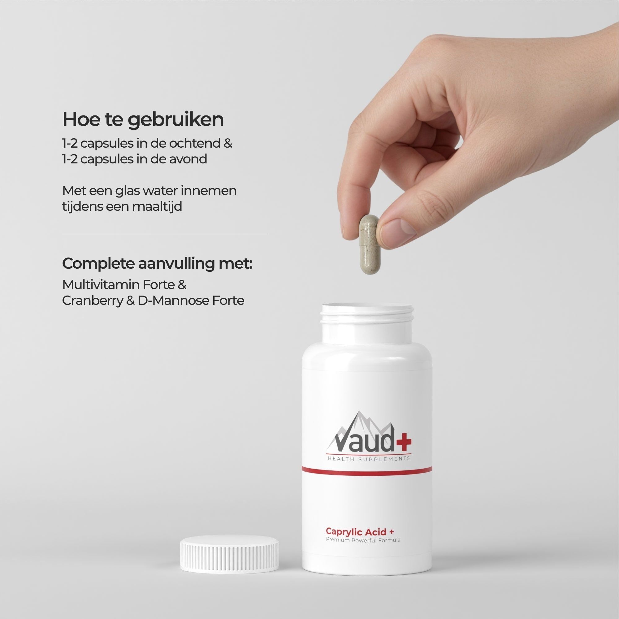 Een hand houdt een capsule boven een wit flesje met het etiket Vaud+ Caprylic Acid.